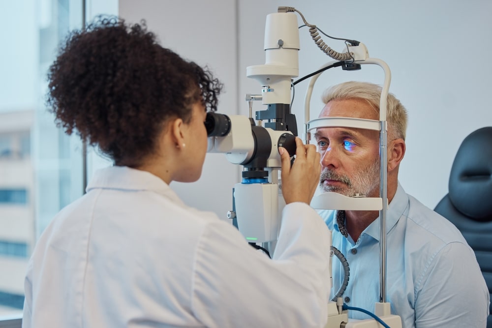 eye doctor examining a patients' eyes